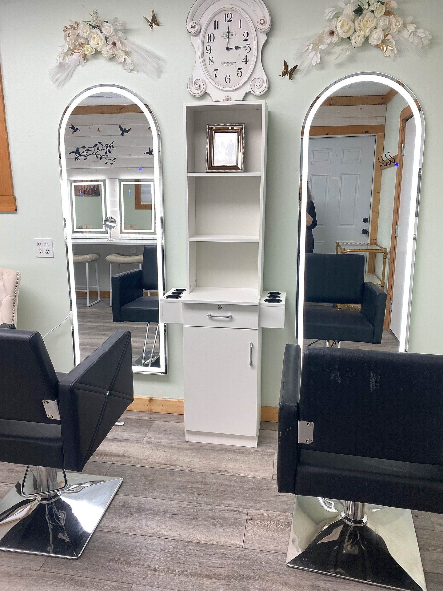 Arched LED salon mirrors and professional styling chairs in the Sandy River Airport Bride's Room getting-ready space